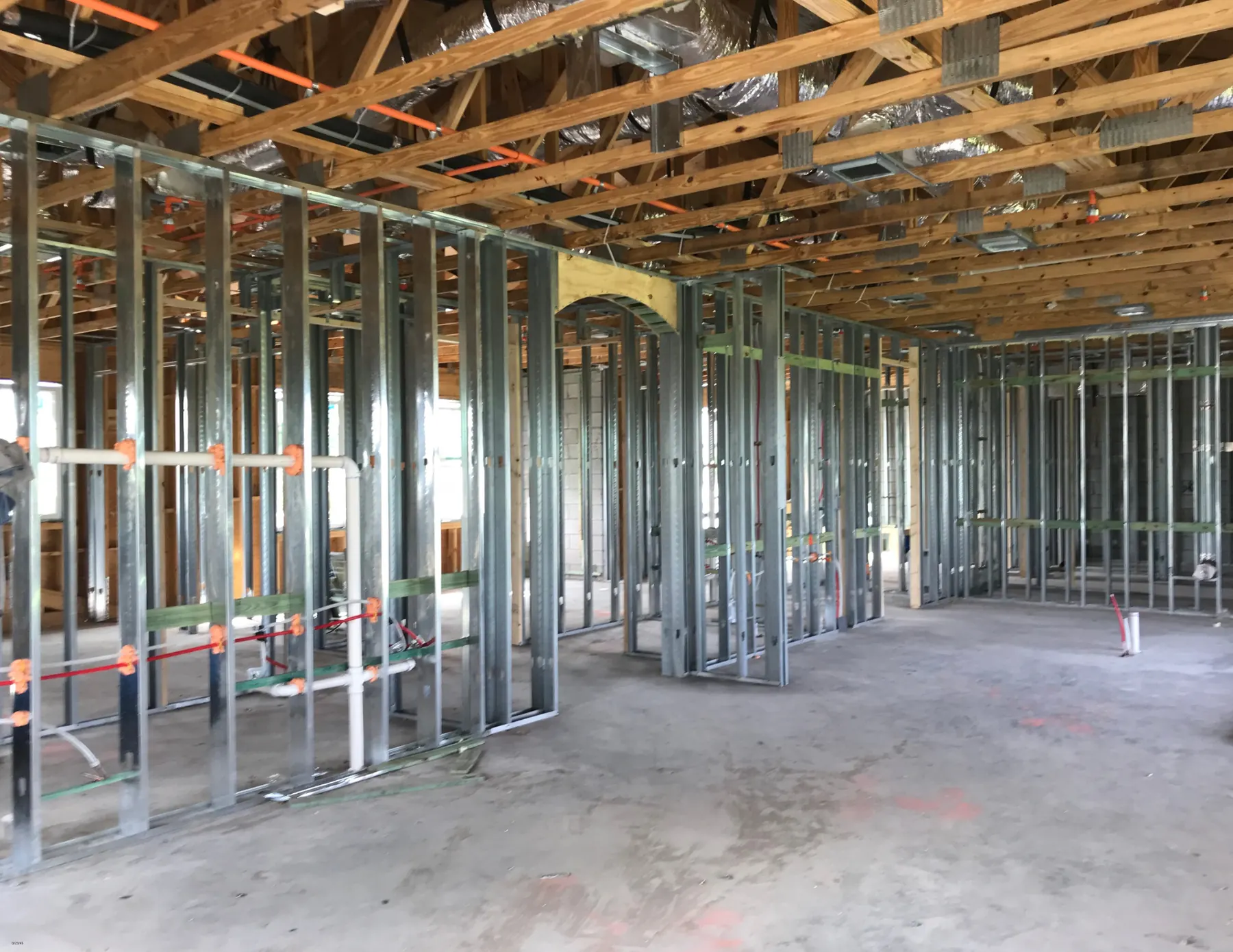 Steel-stud framing inside a commercial build-out, the kind of open structure a laser scan captures before walls close up